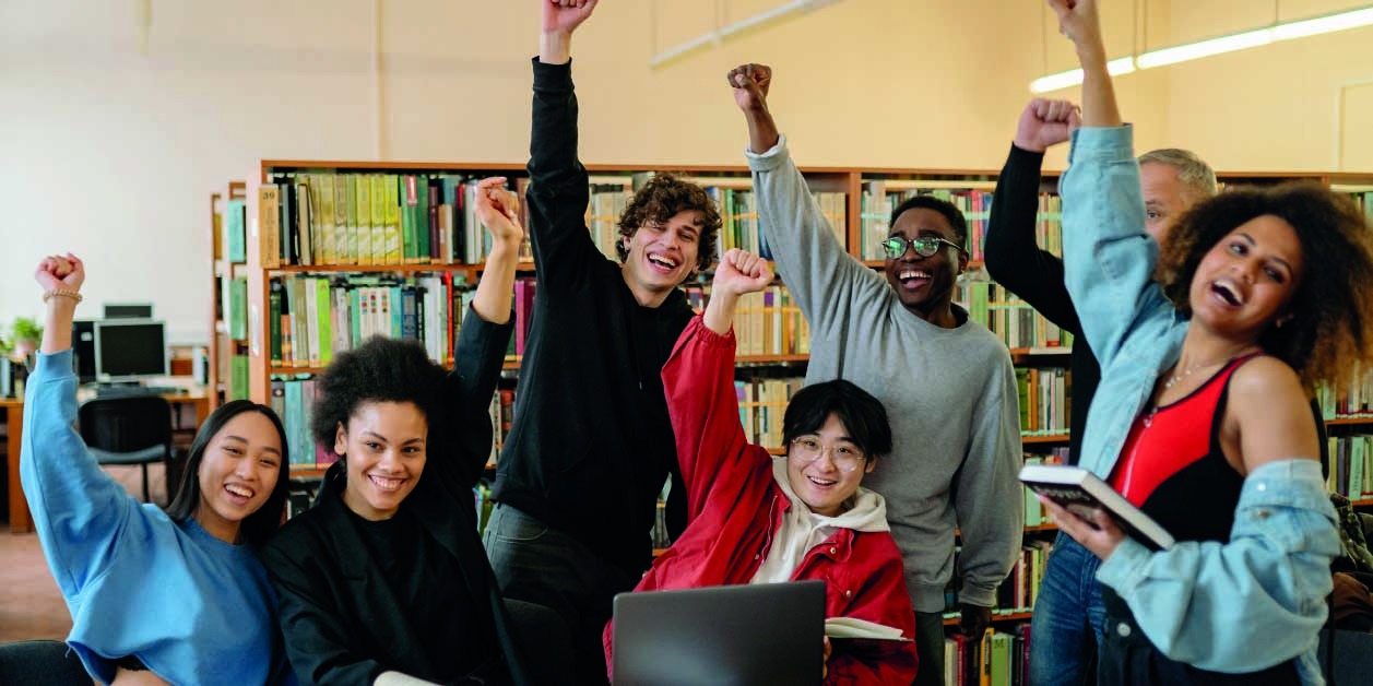 group-of-energic-students-raising-their-hands